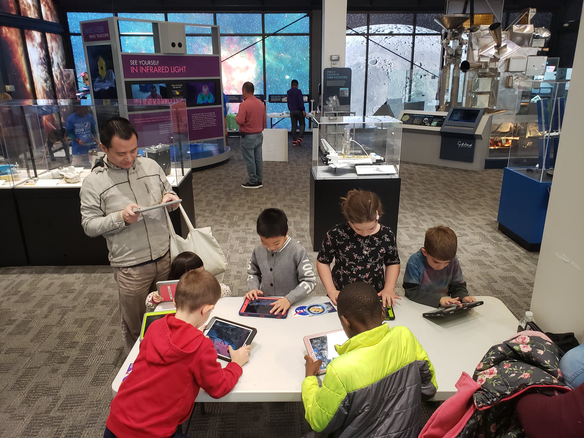Parents and children at Maryland STEM Fest engage with Intergalactic Education games aligned with common core standards